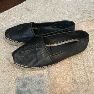 Yves Saint Laurent leather slip on espadrilles.